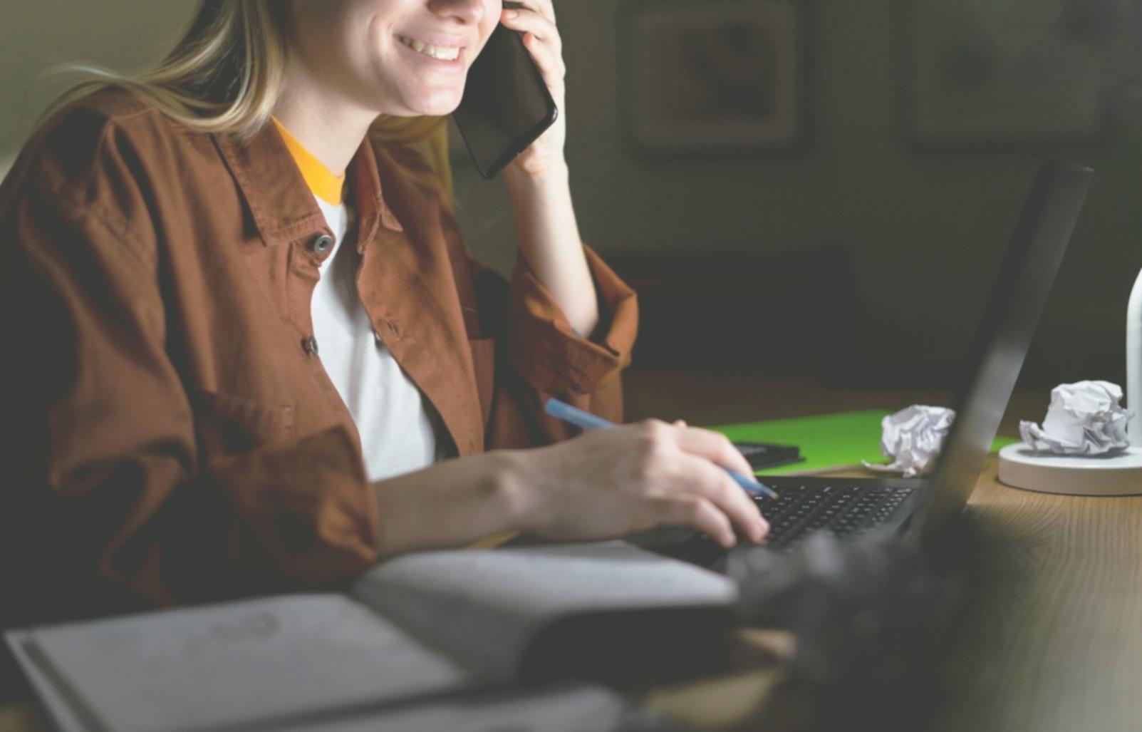 Interactive business planning workshop with participants reviewing financial projections and growth strategies